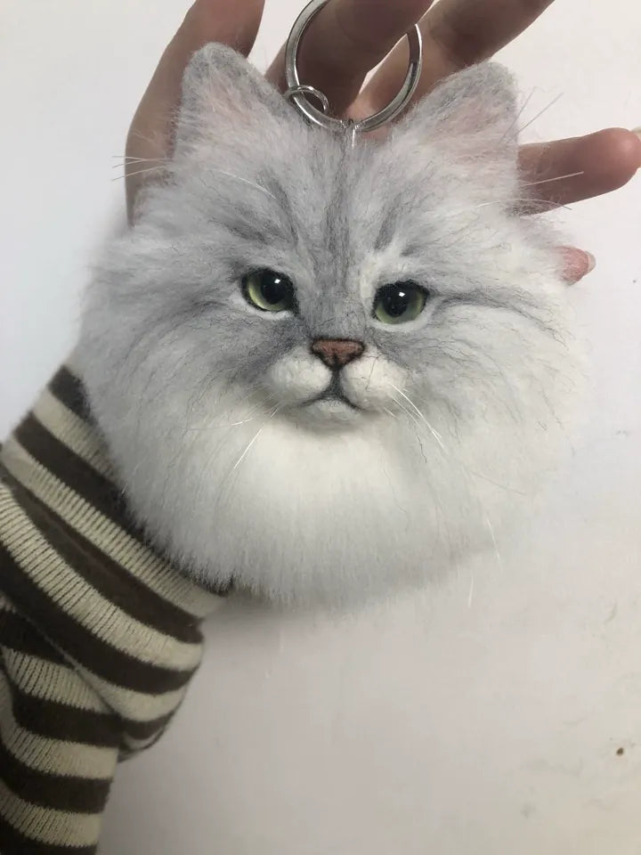 A finished handmade wool felt pet keepsake