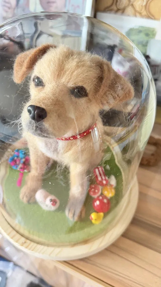 A finished handmade wool felt pet keepsake